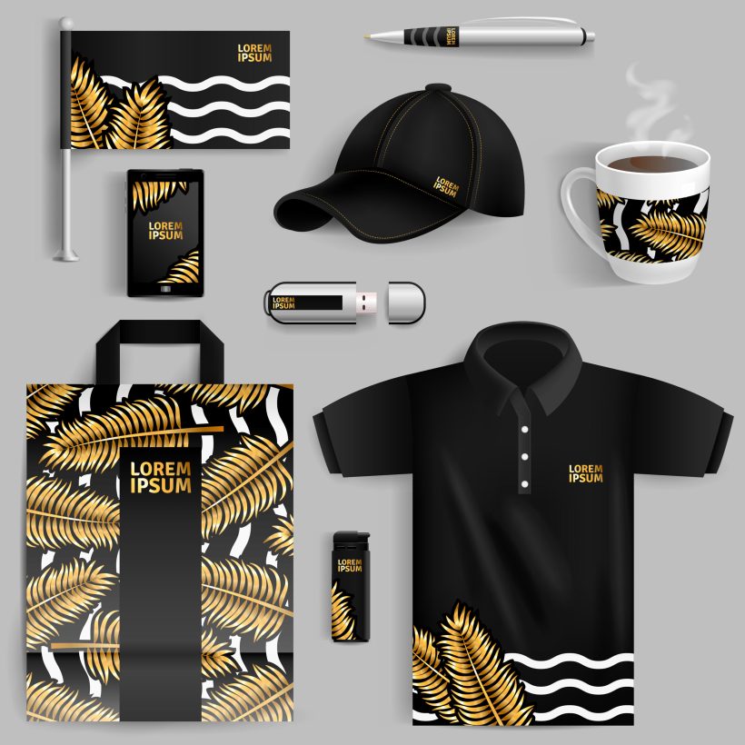 Decorative elements of corporate identity with gold palm leaves in realistic style with pen usb flash drive bag cup baseball cap isolated vector illustration